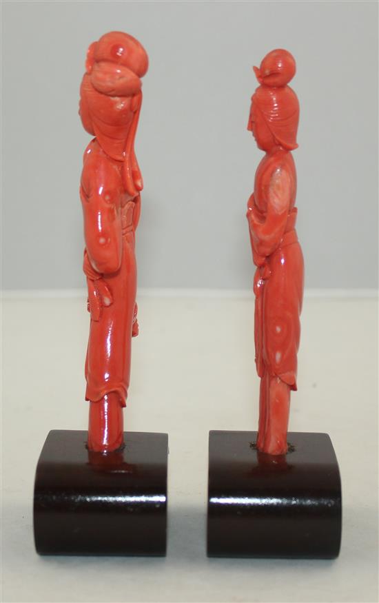 Two Chinese tall coral figures of ladies, 15.5cm & 16.2cm incl. wood stands